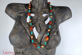 Necklace designed with a combination of lithium beads and large red stone beads