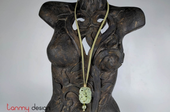 Necklace designed with jade pendant engraved with dragon and leather strap