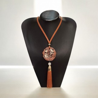 Necklace designed with brown pendant and the leather cord