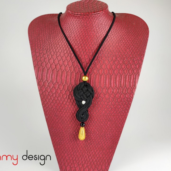 Necklace designed with black cotton pendant