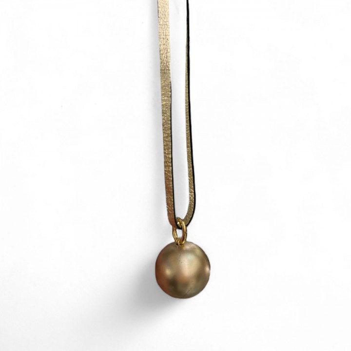 Necklace designed with the round ball pendant and the leather cord