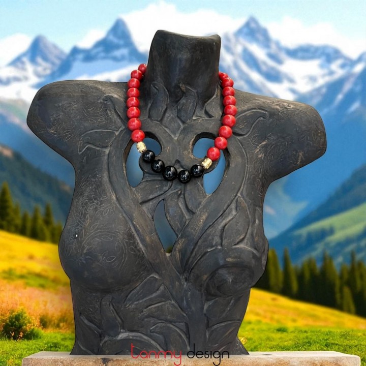 Necklace designed with red coral and black agate