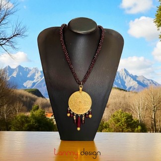 Necklace designed with Garnet, round gold metal Pendant and glass teardrop beads