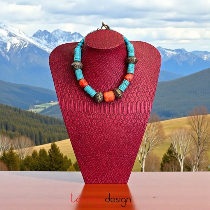 Necklace designed with turquoise, copper metal and coral