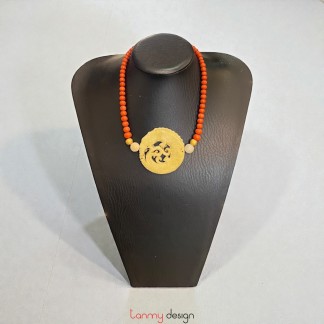 Necklace designed with the white dragon–carved stone pendant and orange coral stone.