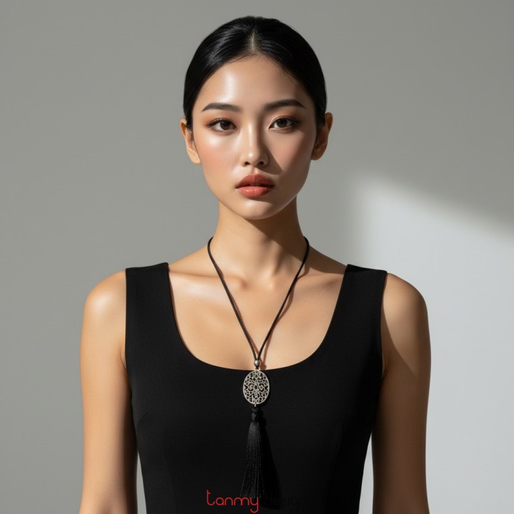 Silver-plated metal necklace with black tassels