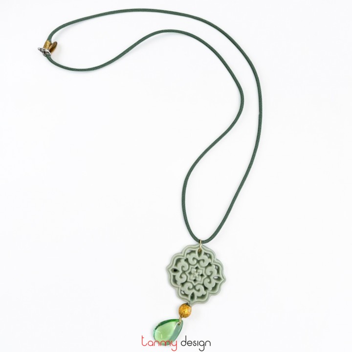Marble pendant necklace with green crystal
