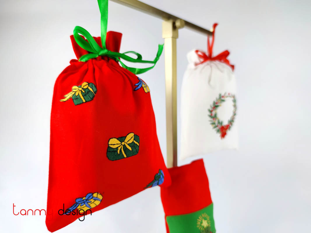   Small red Christmas bag with gift embroidery